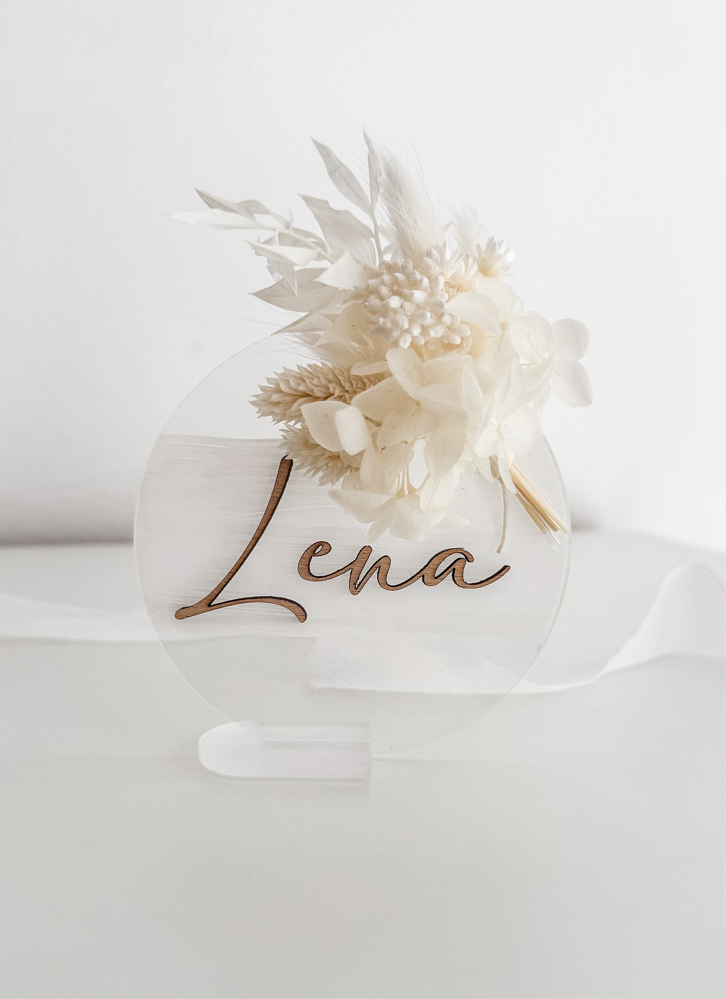Announcement card with name and dried bouquet