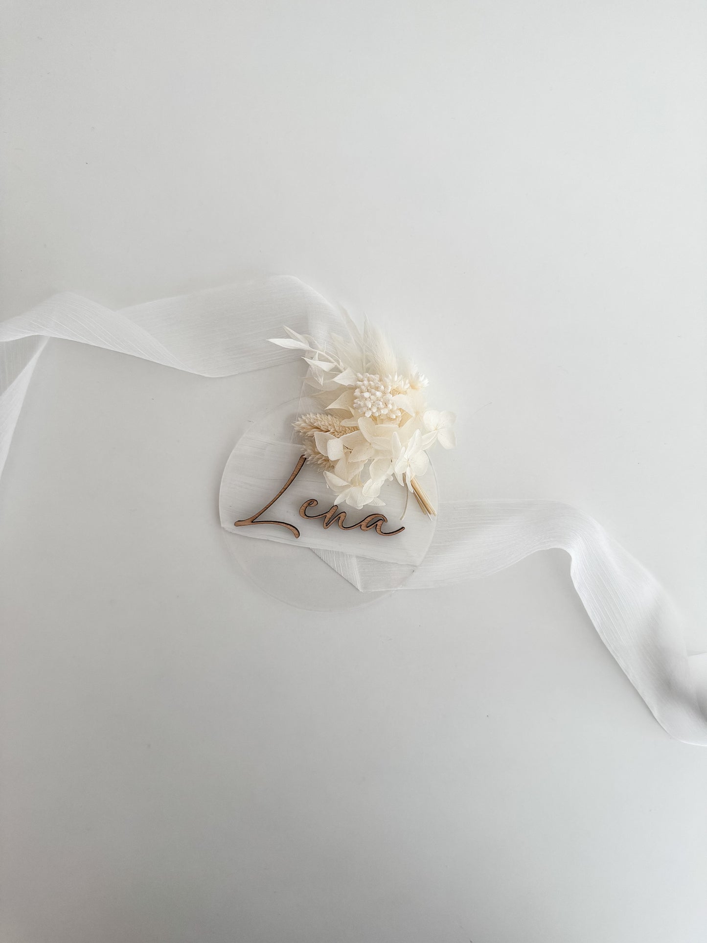 Announcement card with name and dried bouquet