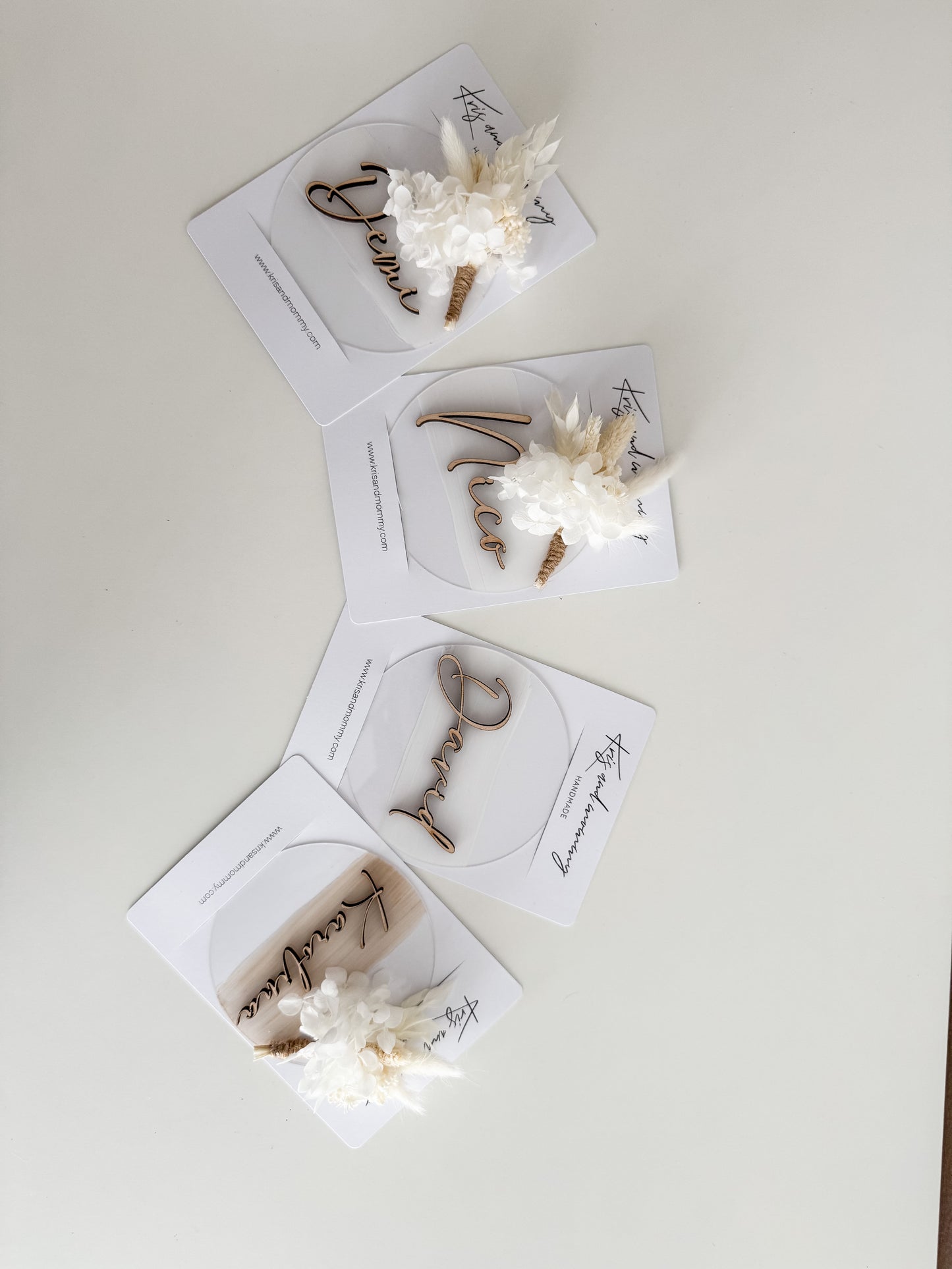 Announcement card with name and dried bouquet