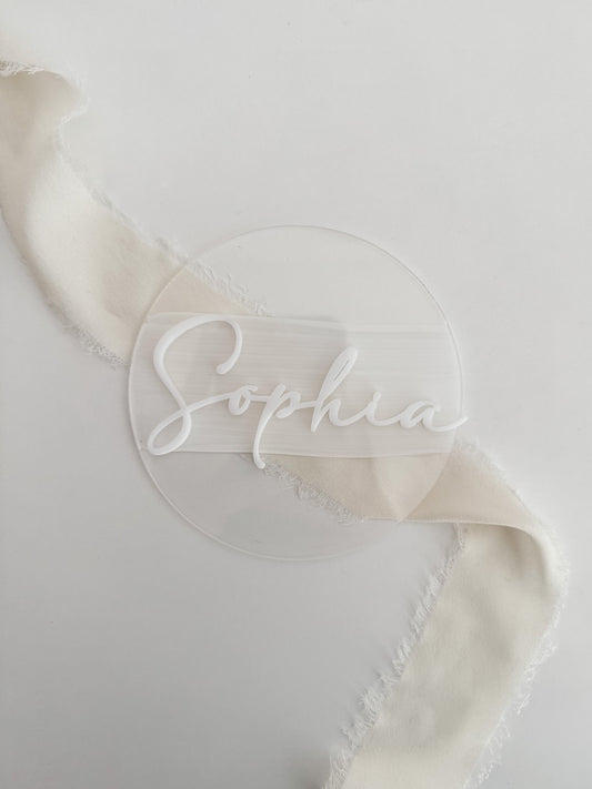 White acrylic birth announcement card with name