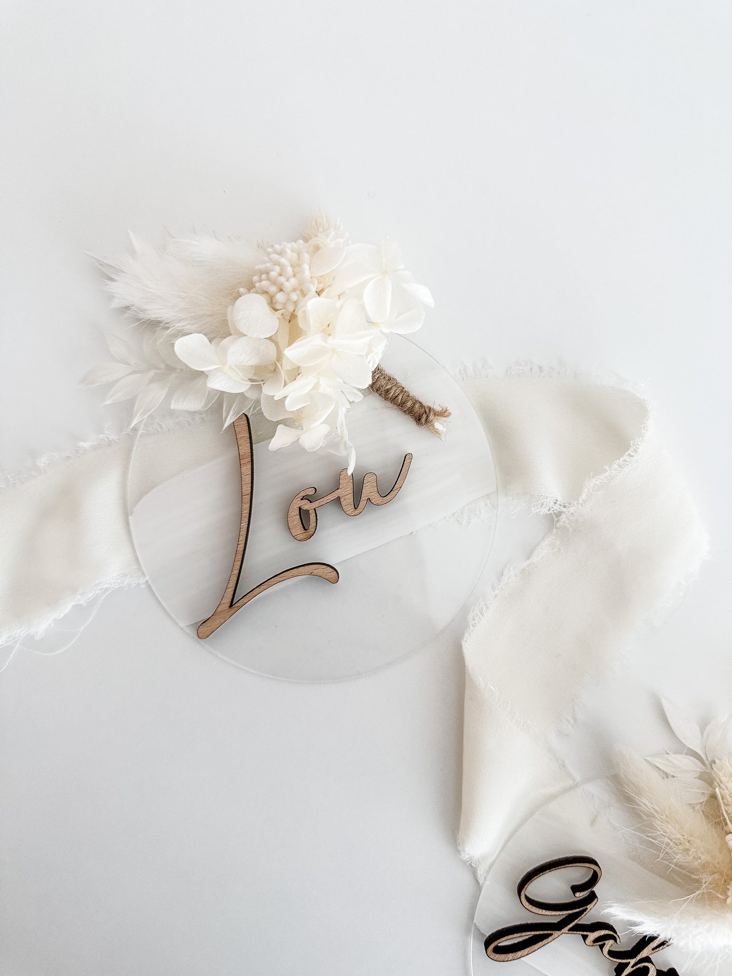 Announcement card with name and dried bouquet