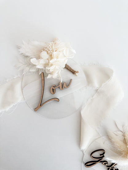 Announcement card with name and dried bouquet